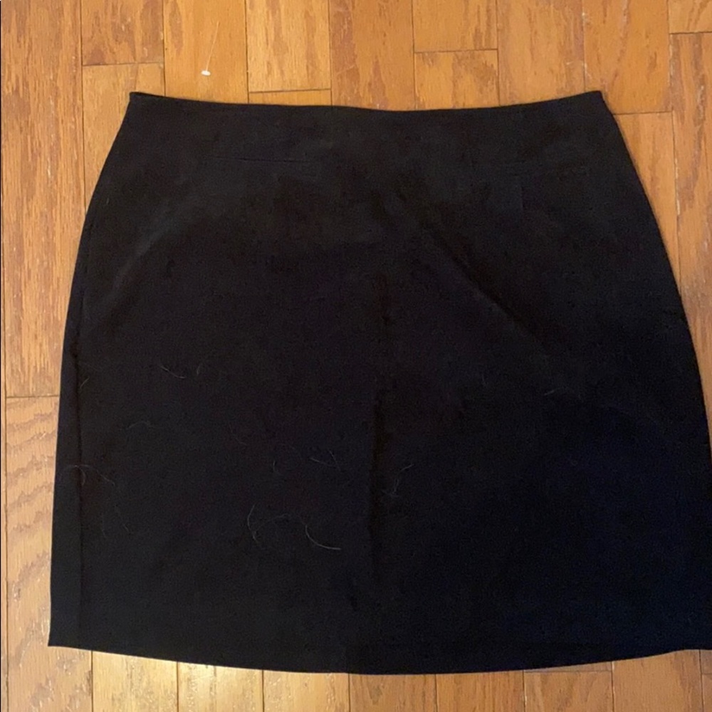 Fitted black mini skirt